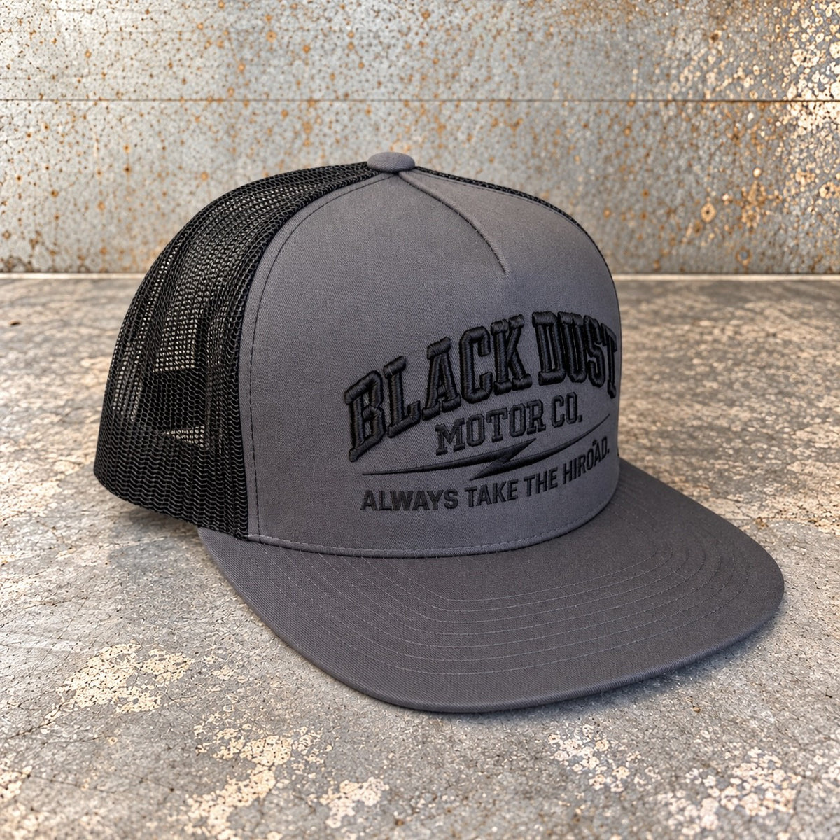 Charcoal trucker hat, three-quarter view