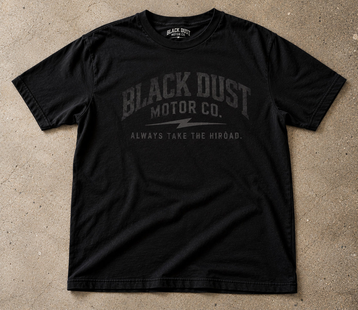 Black tee with the tone-on-tone arched Black Dust Motor Co. logo and lightning bolt