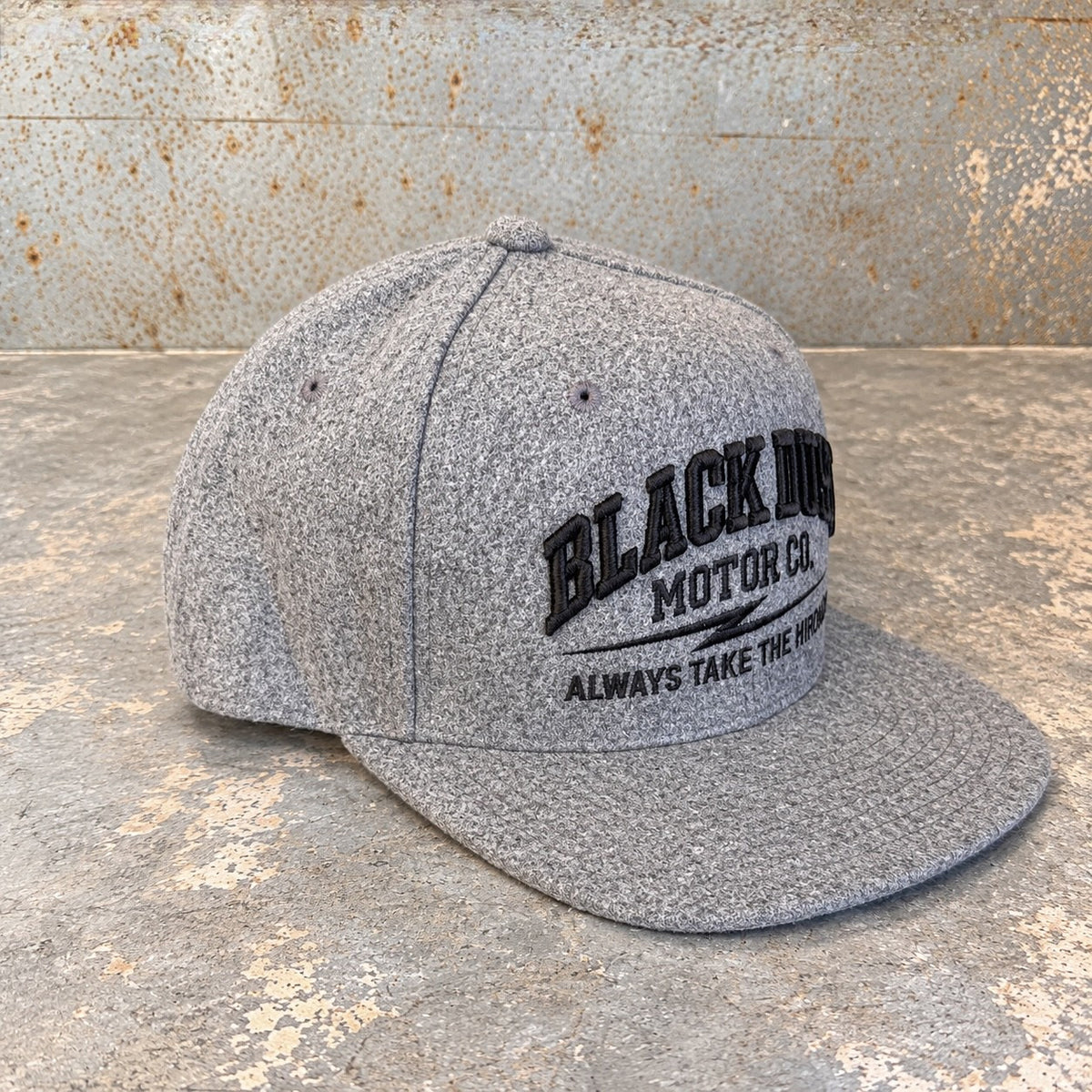 Heather grey wool snapback, side view